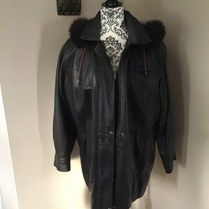 3/4 length leather jacket. Removeable quilt lining and fur trimmed hood
